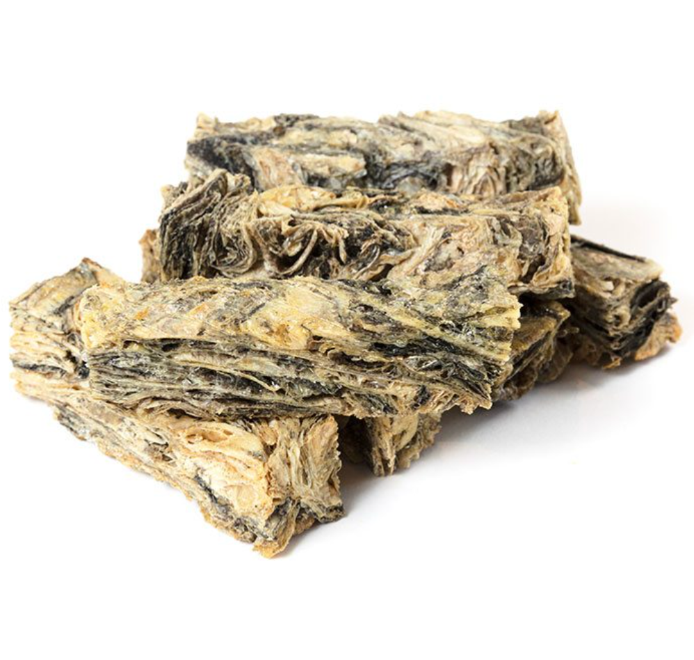 Stack of dried fish skin fingers on a white background