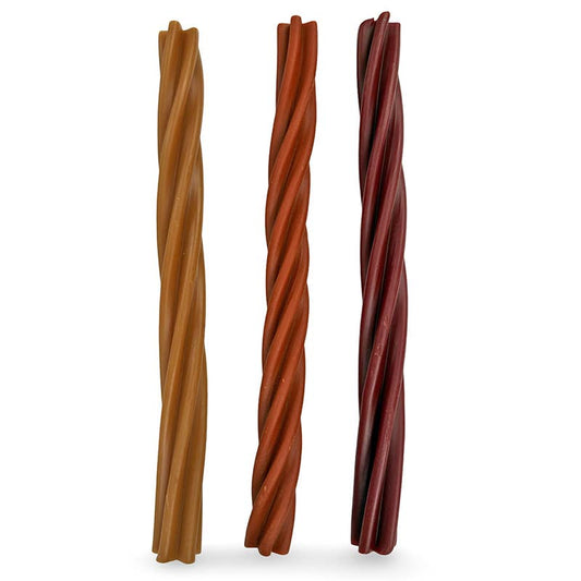 Three twisted vegan dog treat sticks of different colors on a white background