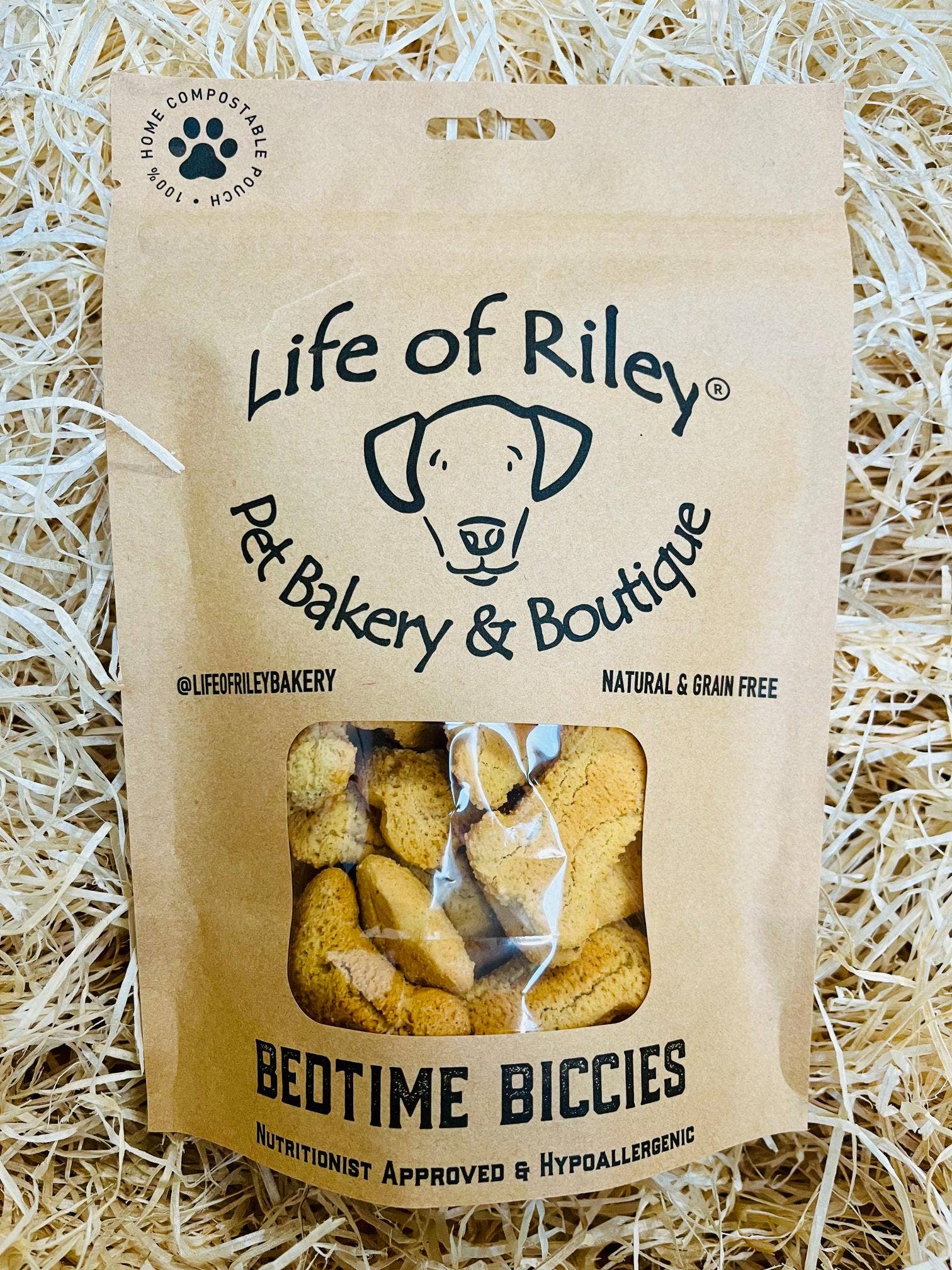 Bedtime Biscuits calming dog treats in a retail , grain-free peanut butter base with chamomile and valerian.