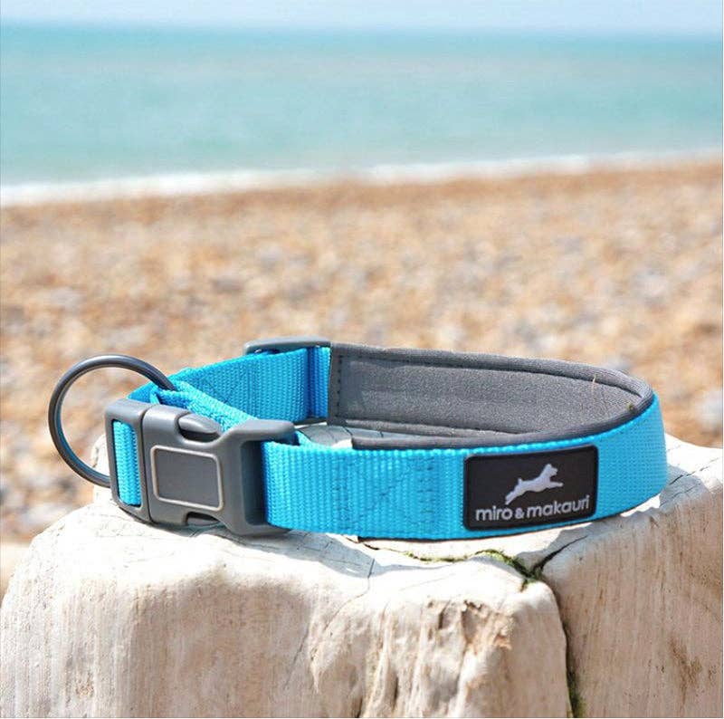 Miro & Makauri neoprene collar showing full range of colours — Aqua Blue, Pink, Orange, Purple, Black, Navy, Red
