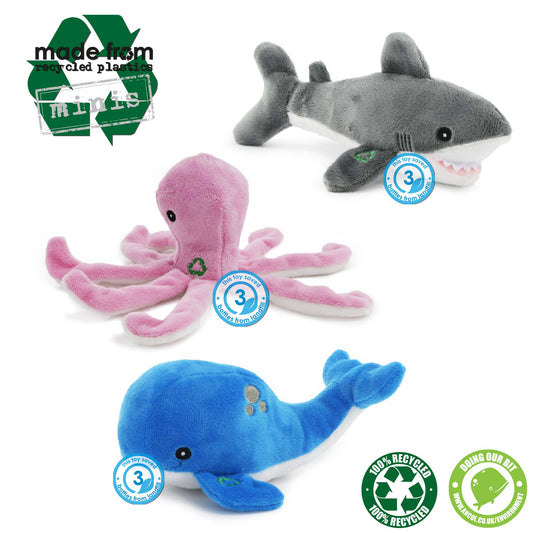 Plush shark, octopus, and whale toys with recycling logos on a white background