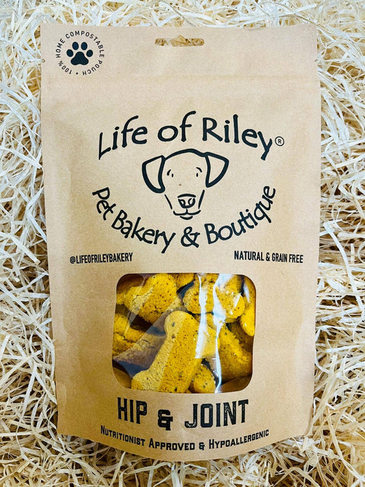 Hip & Joint Bones in retail packaging, natural grain-free dog treats with turmeric and chia for joint health.