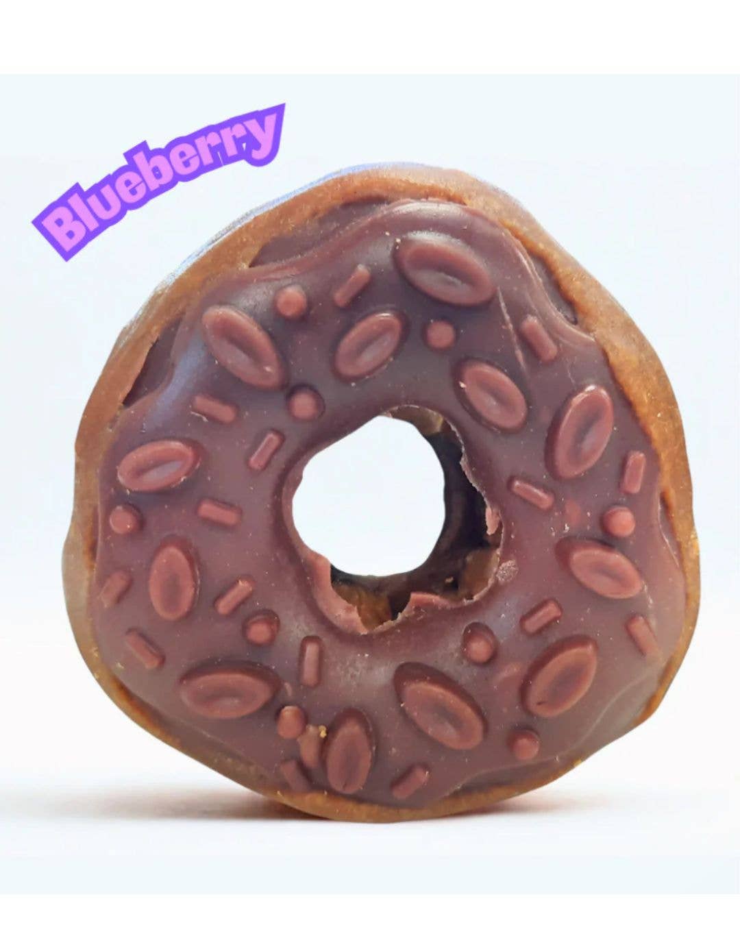 Donut with chocolate glaze and pink sprinkles on a white background, labeled 'Blueberry'.